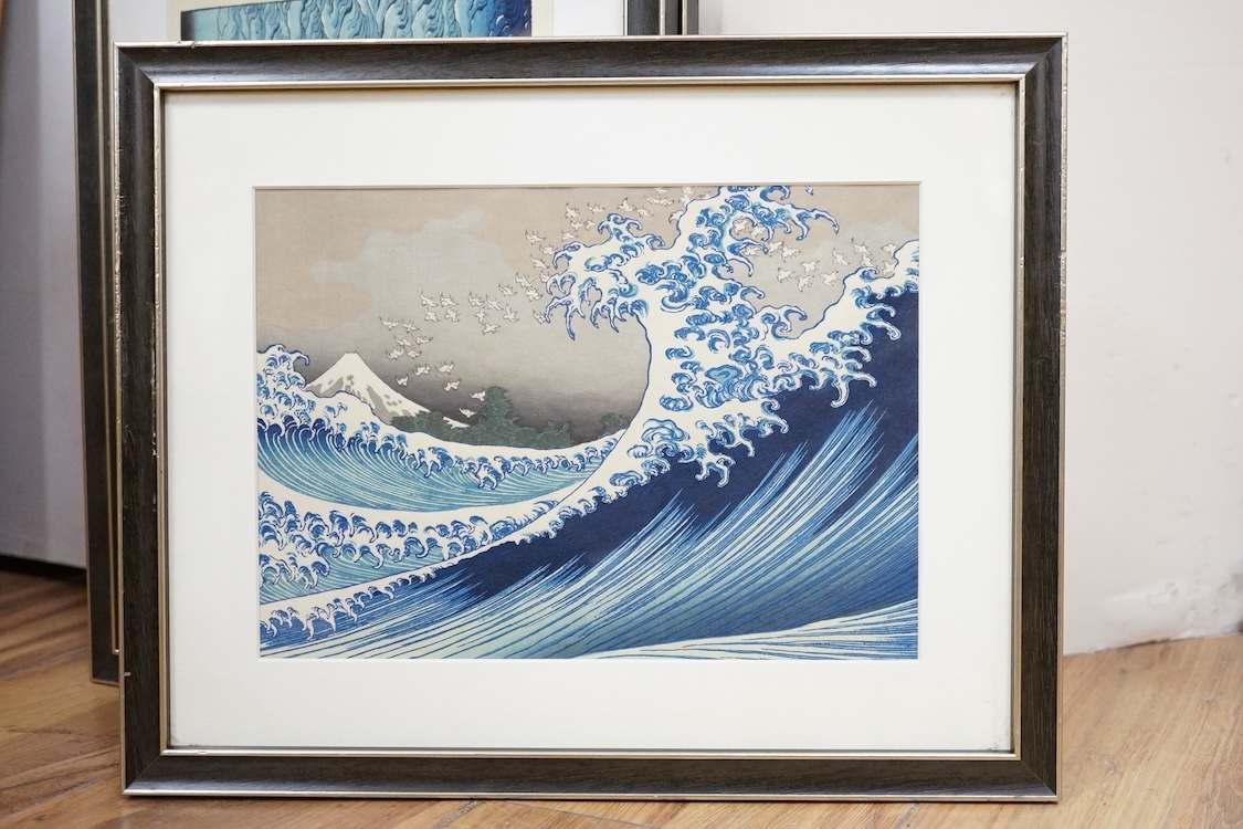 A set of ten Japanese woodblock prints to include ‘Great wave off the coast of Kanagawa’, ‘Fishermen at Kajikazawa’ and ‘Evening shower’, largest 25 x 36cm. Condition - fair